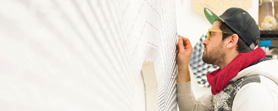 Student focuses on his project.