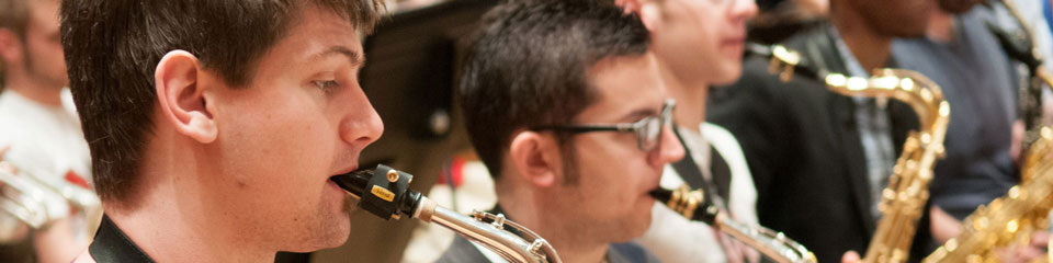The saxophone section of a jazz band.
