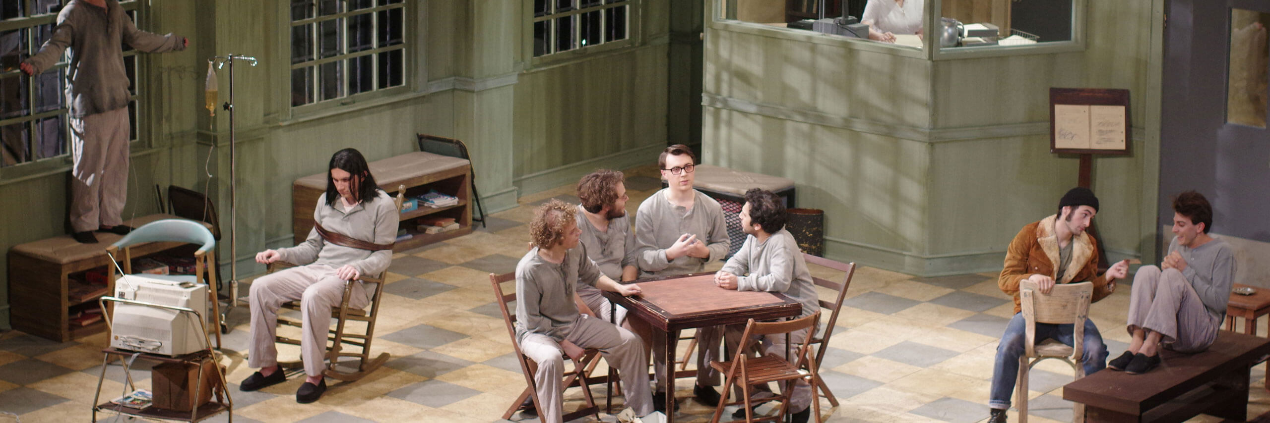 A scene depicting patients in the common room of a sanatorium.