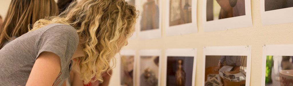 Girl looking at photographs