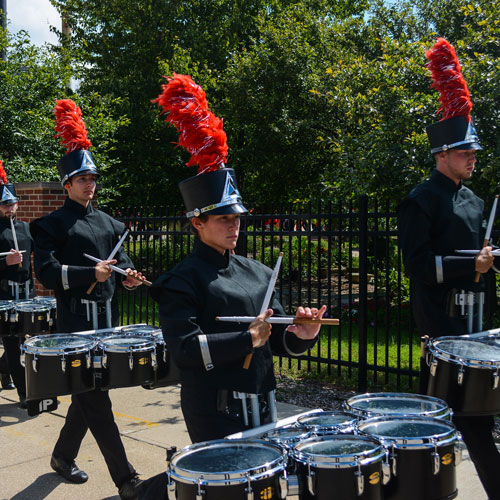 The BRMM Drumline marches in the Labor Day parade.