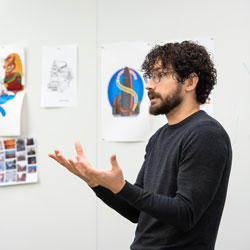 A professor provides feedback on a student's work.