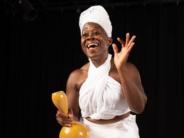 Professor of music and ethnomusicology Ama Oforiwaa Aduonum sings and drums in her performance Walking With My Ancestors.