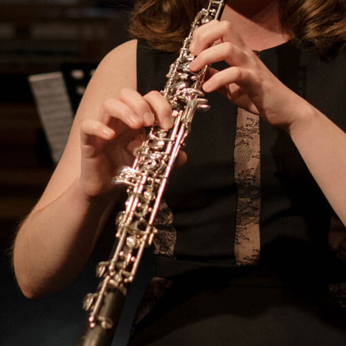 Student plays the oboe.