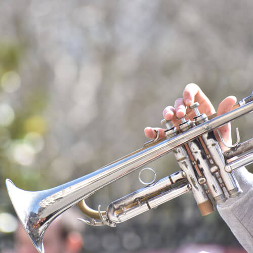 Student plays the trumpet.