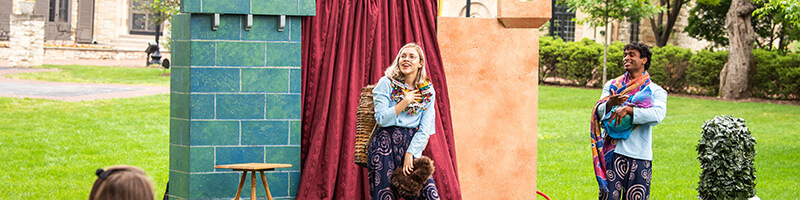 Students acting on outdoor stage